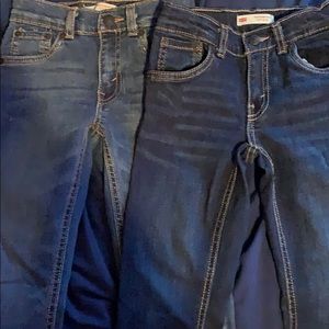 2 pairs of Levi Jeans